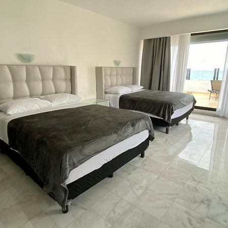 Condo In Ocean Front Resort Cancún Quarto foto
